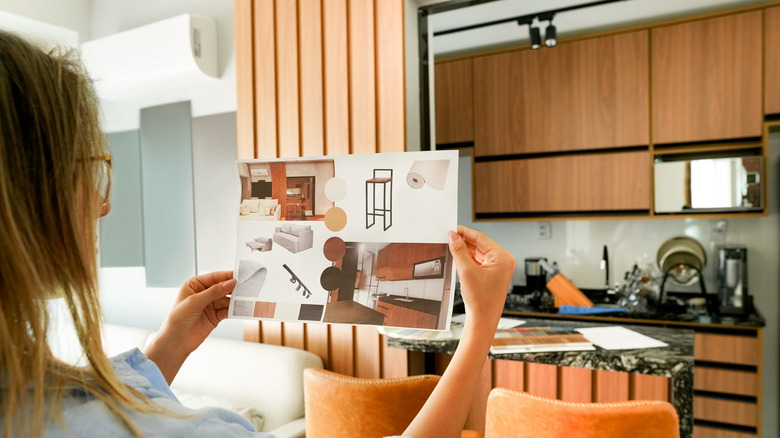 woman planning contemporary kitchen remodel