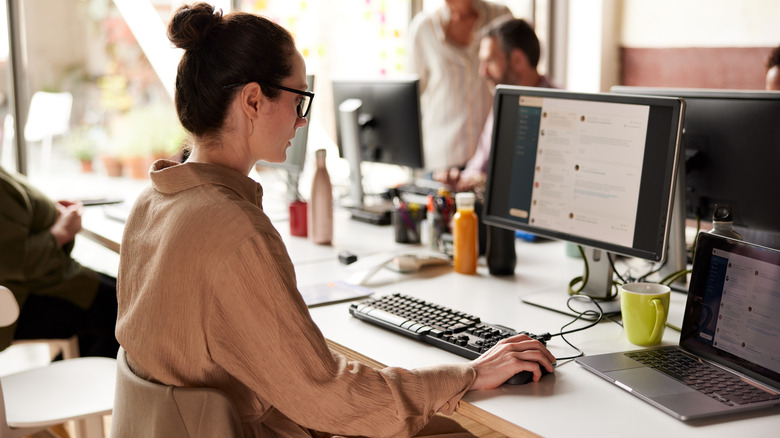 woman sending email