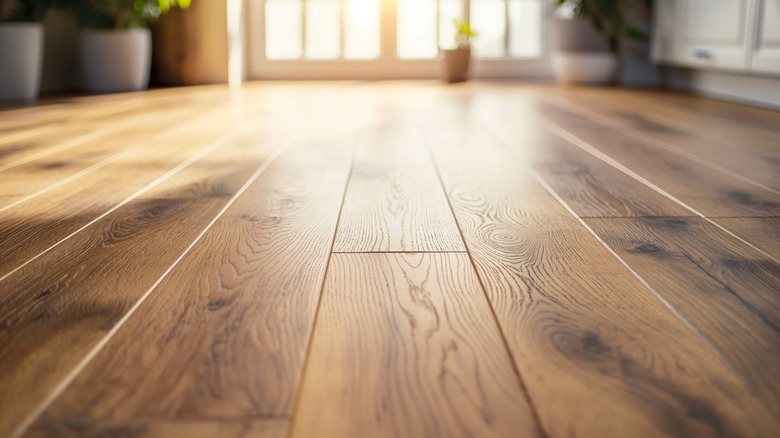 A close up of hardwood floors in a home