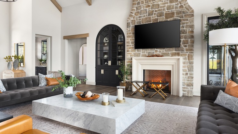 TV mounted over fireplace