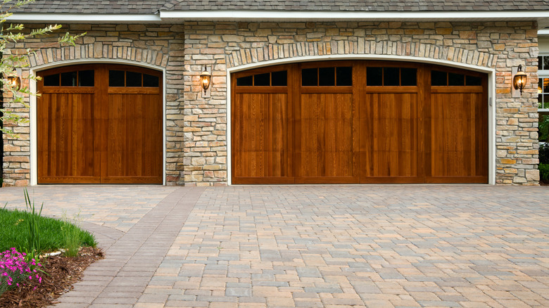 A house with a paver driveway