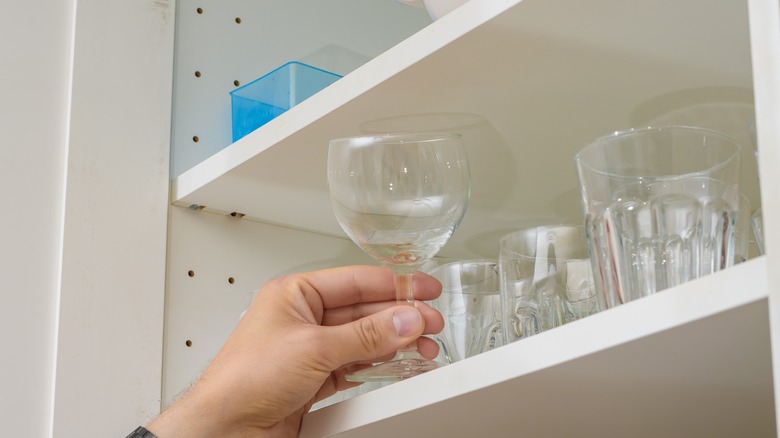 removing wine glasses from kitchen cabinet