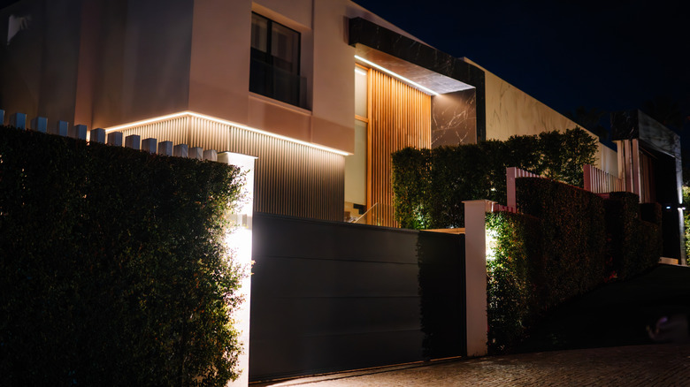 Home with different types of exterior lighting