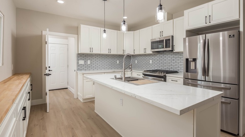 Kitchen with white cabinets