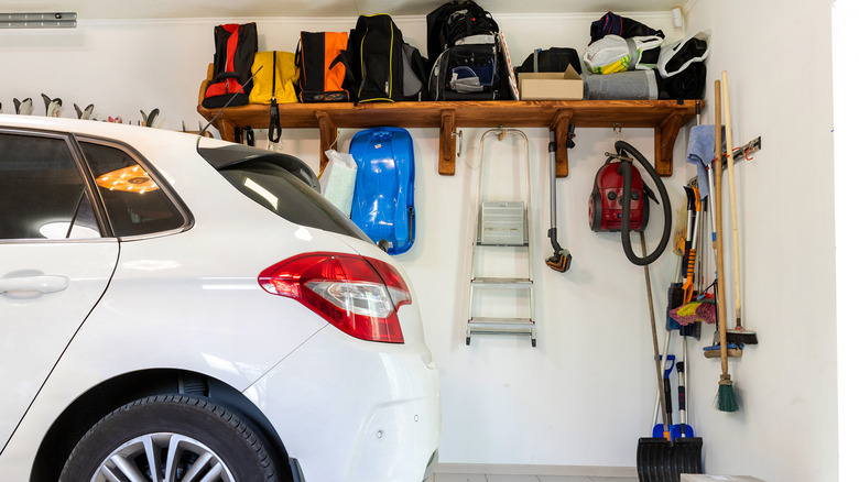 Vacuum cleaner hanging in garage 