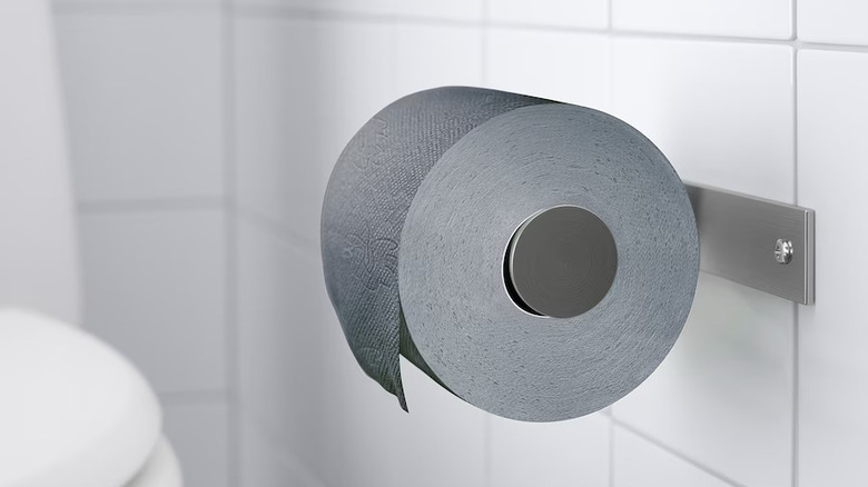 gray toilet paper on tile