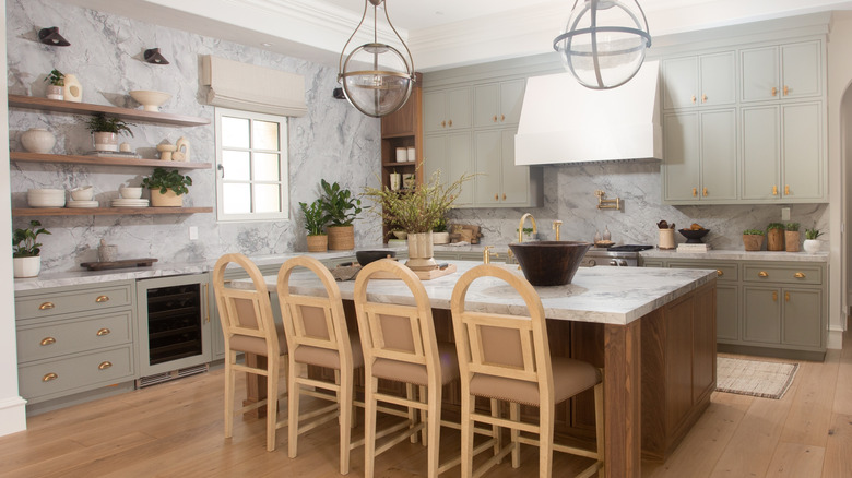 A marble kitchen with a full-height marble countersplash