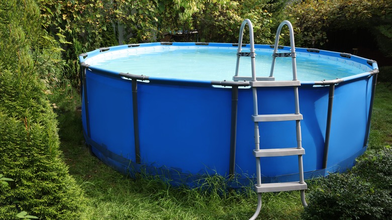 Above-ground pool on top of grass