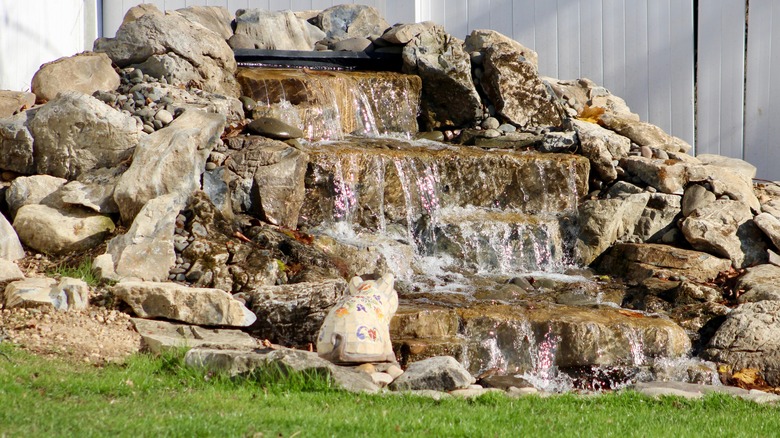 Pondless waterfall in backyard