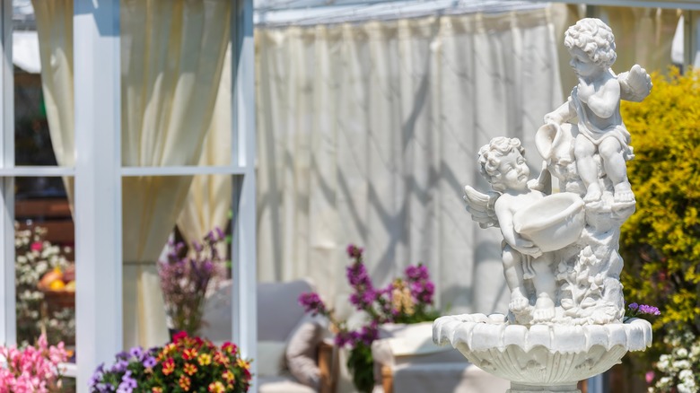 Angel fountain in backyard