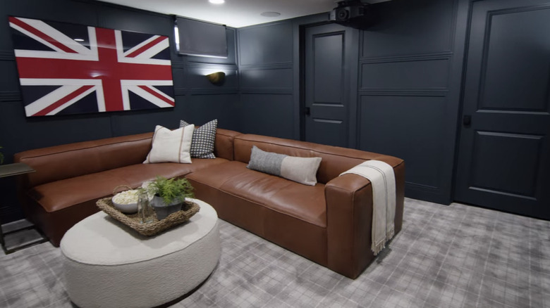 Leather couch in navy room