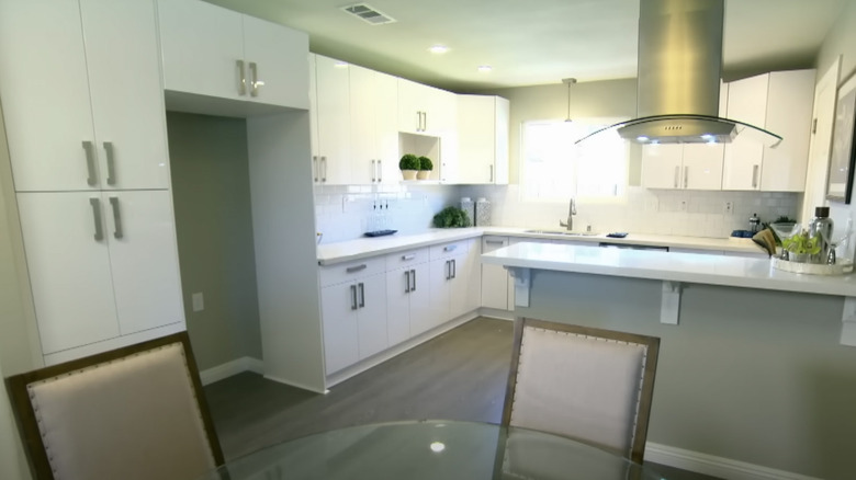 bland white kitchen with island