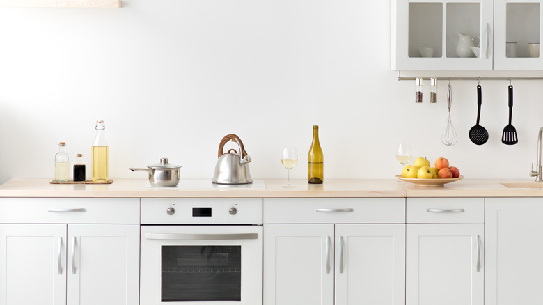 minimalist all white kitchen