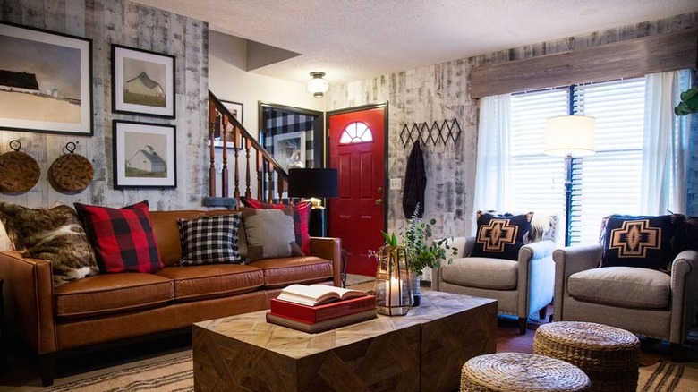 living room with patterned wallpaper