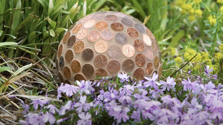 ball of pennies in garden