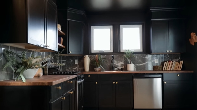 Black kitchen with natural accents