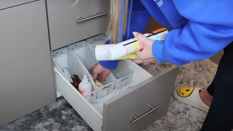 white book bins in drawer 