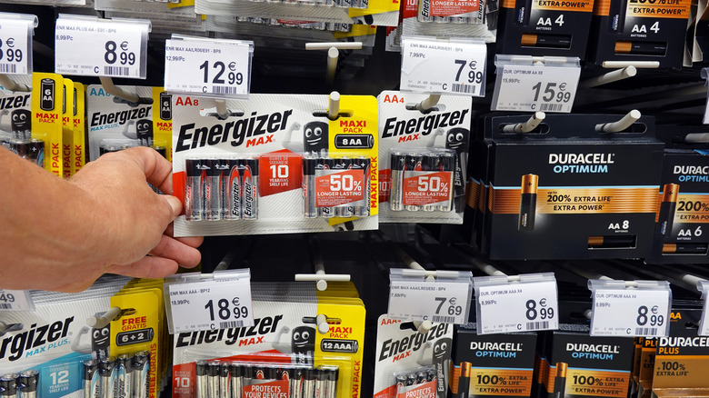 Energizer and Duracell batteries in a retail display