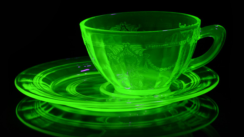 A uranium glass is placed under blacklight