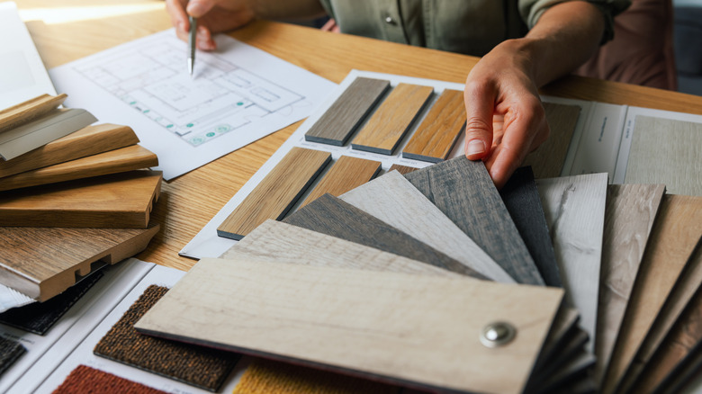 Designer looking at flooring samples