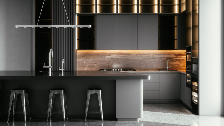 Black kitchen island in modern kitchen