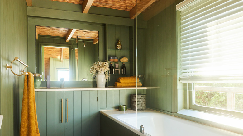 green paneled bathroom