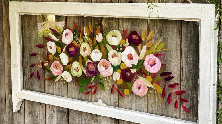 flowers painted on upcycled window