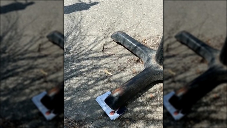 Business cards under a wobbly table