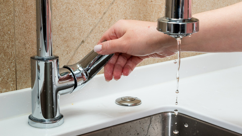 Water trickling from a faucet