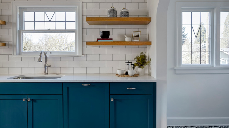 Blue painted kitchen cabinets