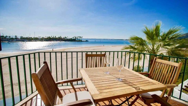 Bistro table on patio overlooking beach 