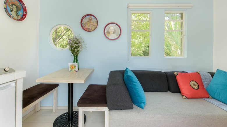 living room with art and pillows