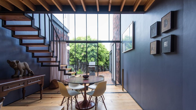 entryway with stairs and windows