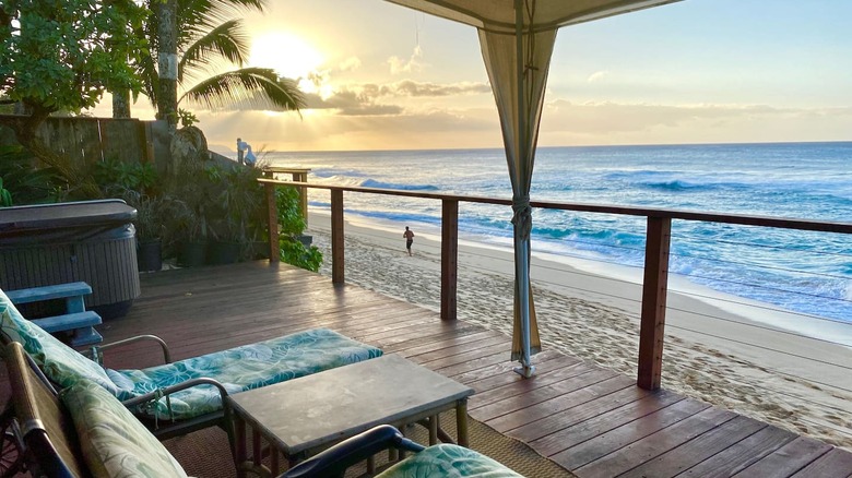 oceanside patio at sunset