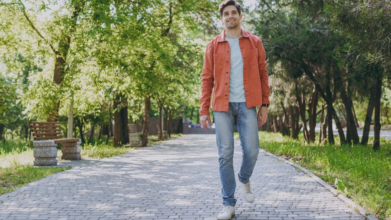 man walking in park