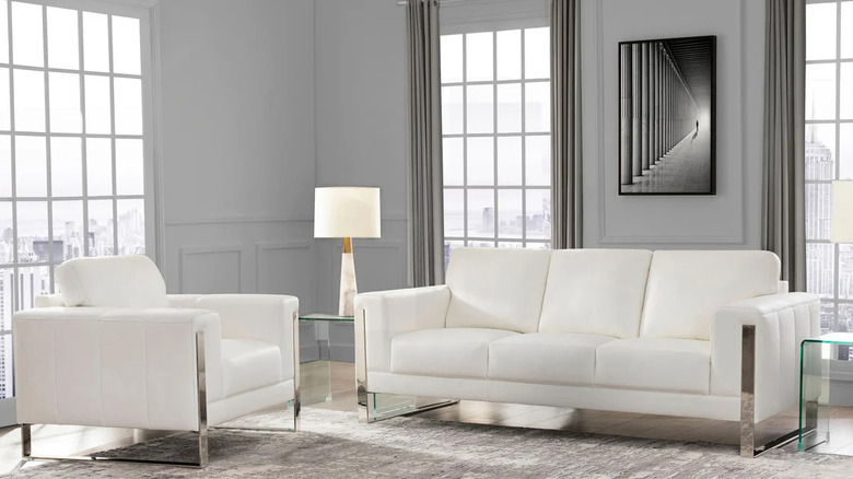 elegant white sofa set with metal accents