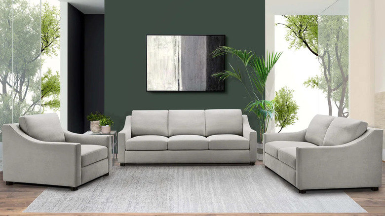 elegant white couches with sloped arms