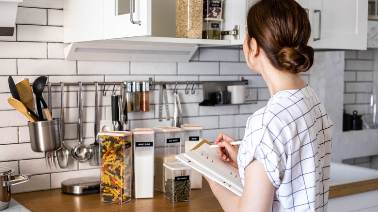 woman organizing the kitchen