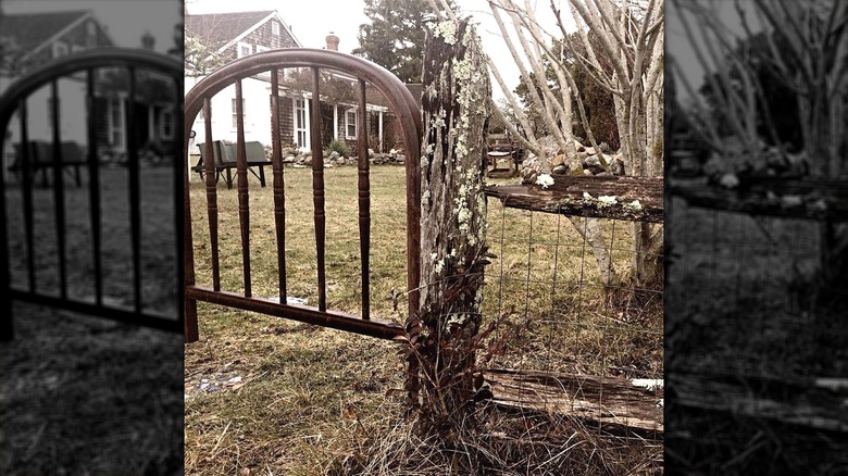 A metal headboard garden gate