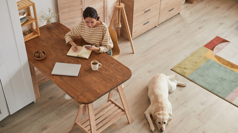 Woman working in warm toned office