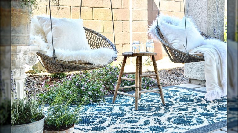 Hanging swing chairs in patio