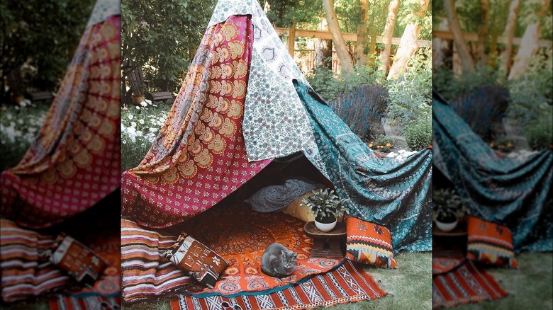 Blanket fort in backyard