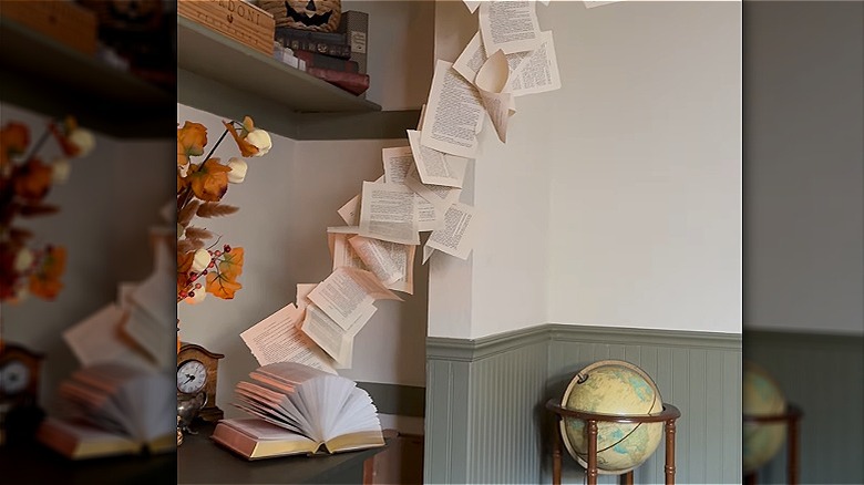 whimsical floating book pages decoration