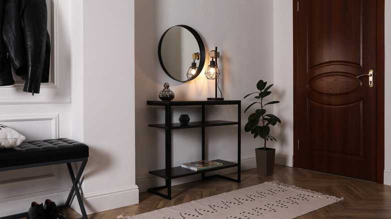 Entryway with black decor