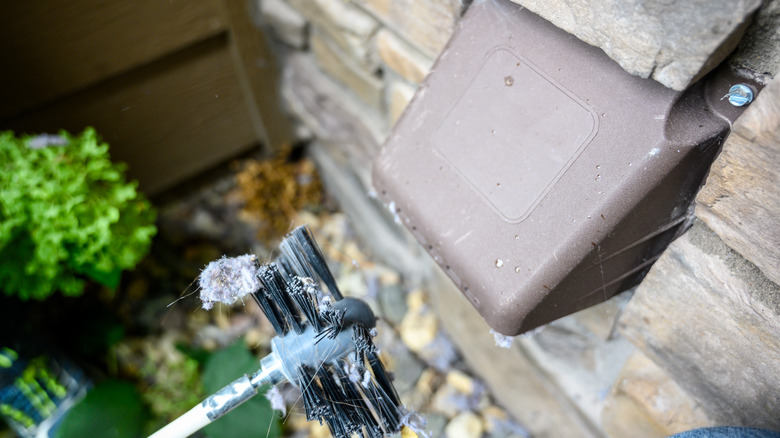 cleaning dryer vent with brush