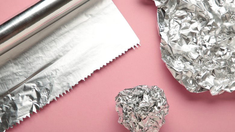 Roll of foil next to balled-up foil