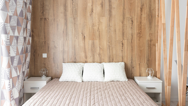 wood paneling wall in bedroom