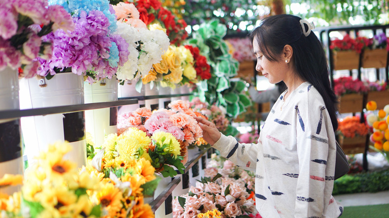 woman shopping for flowers