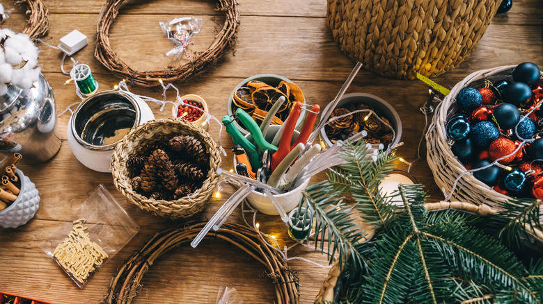 Table filled with festive craft supplies