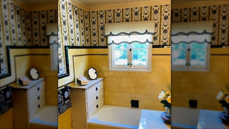 Bathroom with yellow vintage tile and blue floral wallpaper